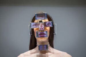 Woman sculpture LED screens on your face. The image is part of the Virtual Beauty Exhibition