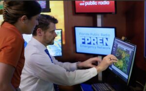 Florida radio conveying alerts about hurricane, work done by the public media network of cuts in the Trump government