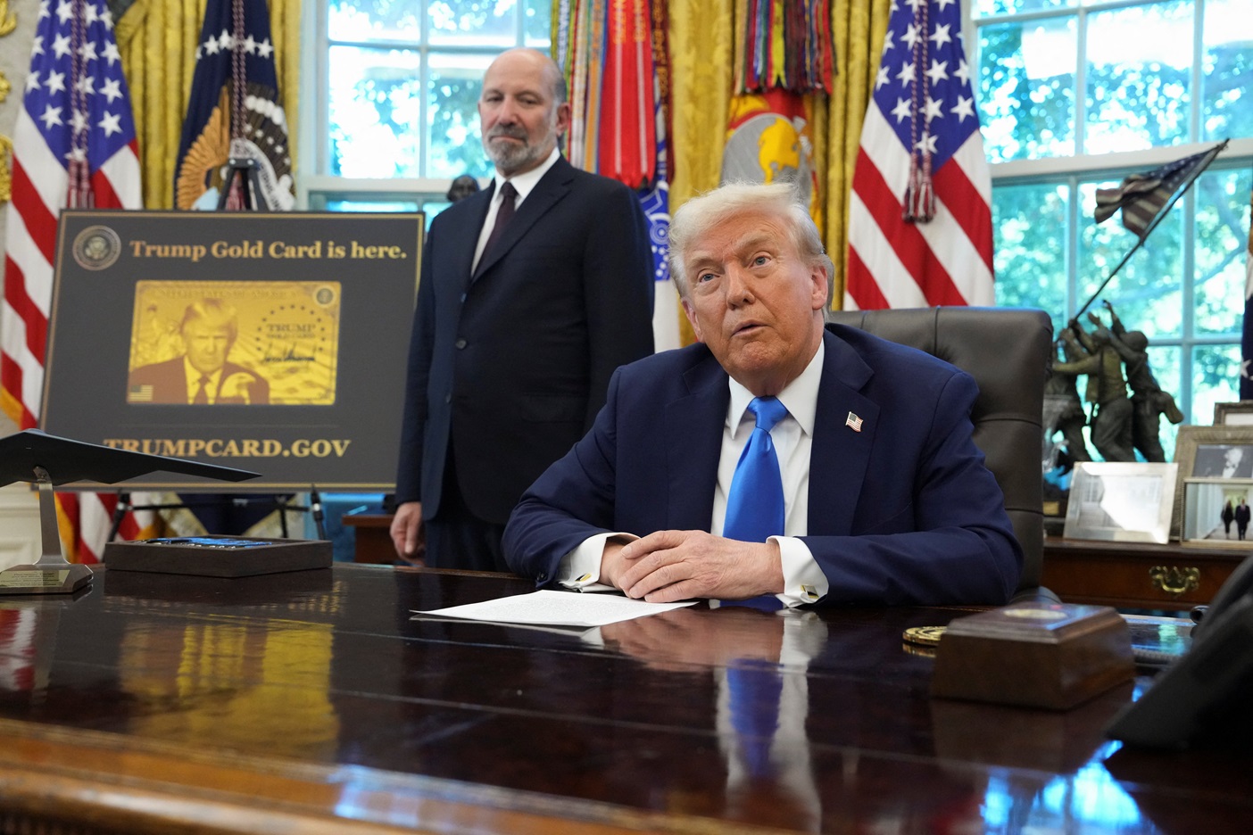 What is the H-1B visa program and how is Trump changing it?