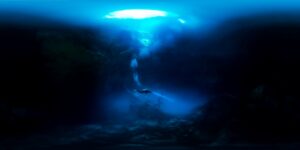 Diving in the depths of the sea in Tulum, Mexico. Top100 in the panoramic photography contest