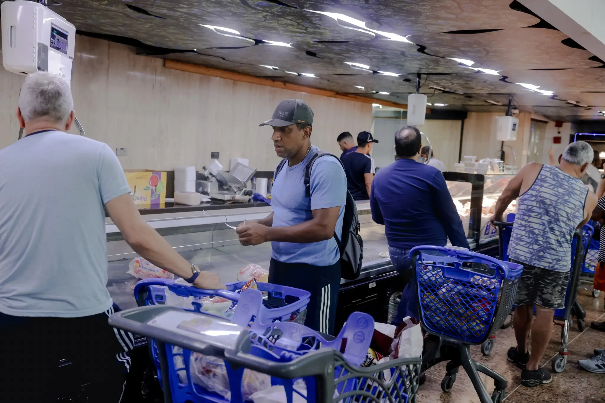 With the president's departure, Venezuelans rush to stock up on food