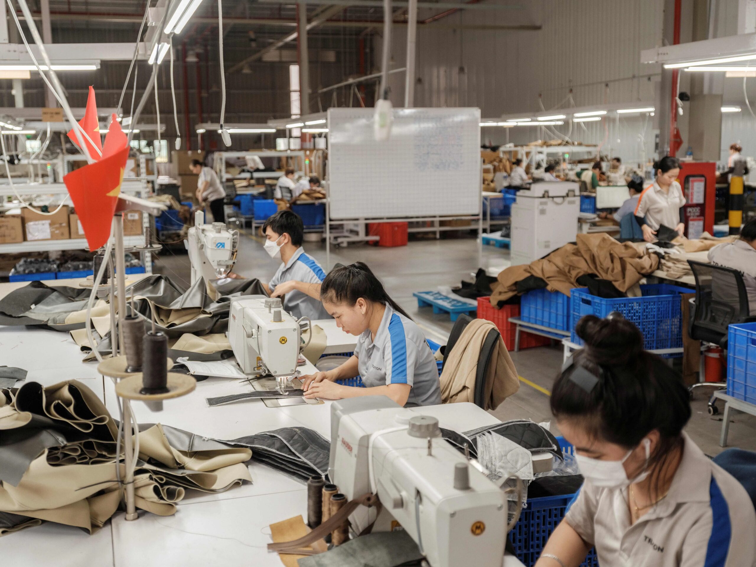 Trabalhadores em fábrica do Vietnã (Foto de arquivo: Linh Pham/The New York Times)